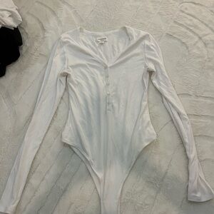White button up body suit size small.